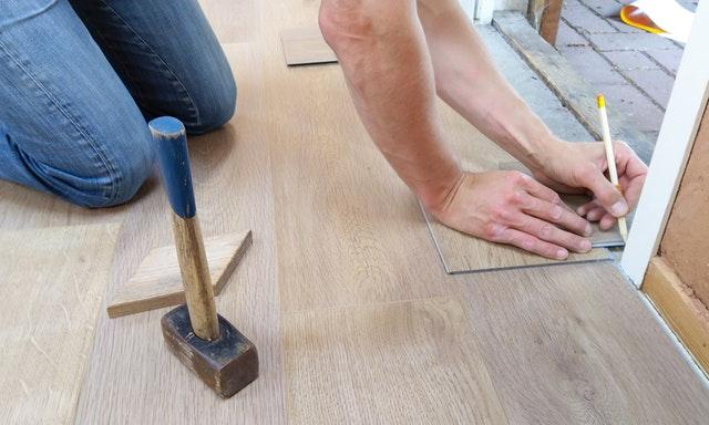 hope-mills-property-maintenance-repair-worker-fixing-flooring